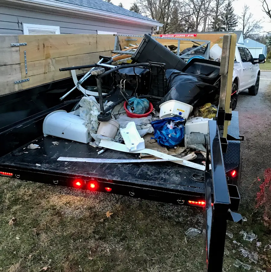 Roll-off dumpster delivered to a residential driveway in Gulf Gate